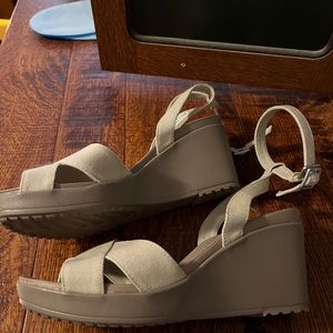 Tan/sand Croc ankle wrap wedge heels.  Size W9